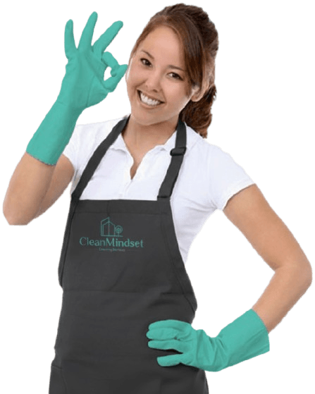 Professional cleaning team member giving thumbs up